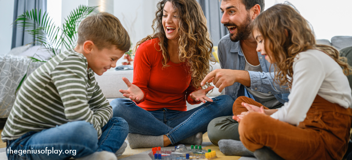 Young parents playing a board game at home with their elementary school aged kids and having fun.