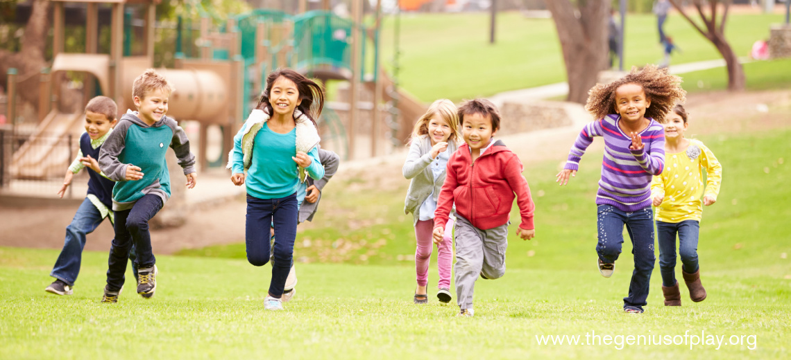 young children running in a playground park