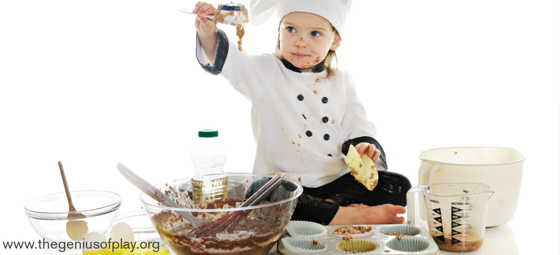 preschooler dressed as chef surrounded by STEM baking utensils